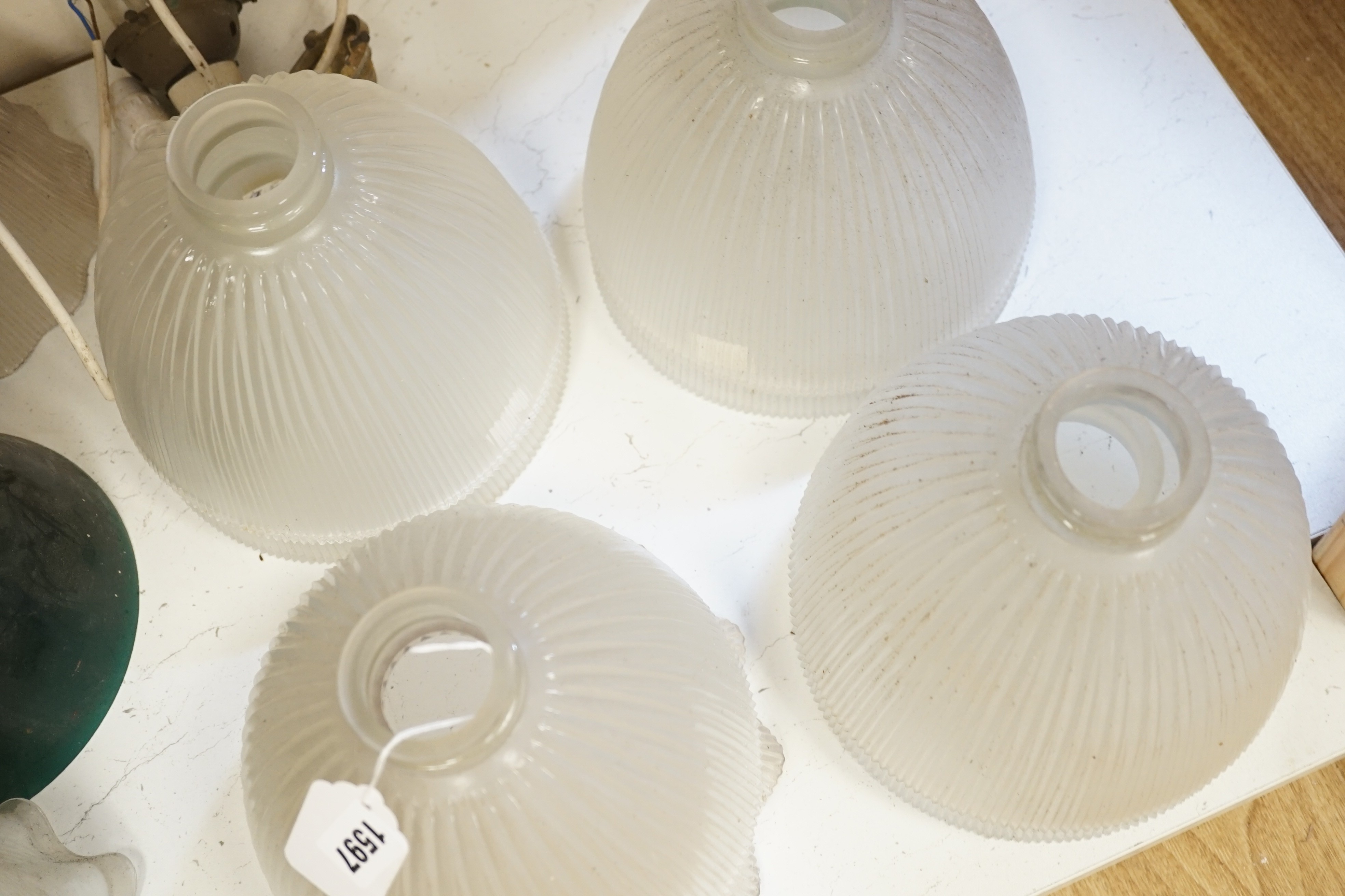 A collection of 11 late 19th/early 20th century glass light shades